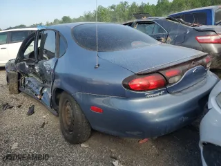 1999 Ford Taurus LX with VIN 1FAFP52UXXA159704, listed as a Copart auction lot 52350774 with 112,562 mi miles and Salvage Title. Bid and sale history available at carsss.com. Image 2.