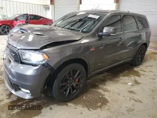 2018 Dodge Durango SRT with VIN 1C4SDJGJ4JC415680, listed as a Copart auction lot 51823495 with 105,998 mi miles and Salvage title. Bid and sale history available at DreamBid. Image 1.