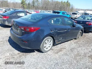 2018 Mazda 3 Sport with VIN 3MZBN1U77JM162467, listed as a IAAI auction lot 41821629 with 98,782 mi miles and . Bid and sale history available at DreamBid. Image 4.