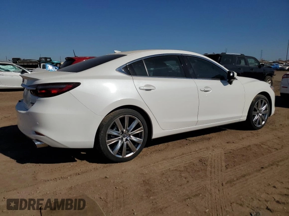 2021 Mazda 6 Signature with VIN JM1GL1XY5M1614601, listed as a Copart auction lot 73769893 with 22,617 mi miles and . Bid and sale history available at DreamBid. Image 3.