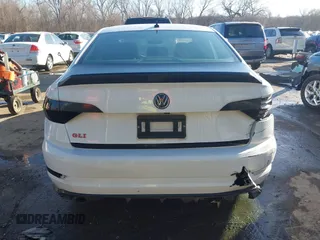 2019 Volkswagen Jetta GLI S z VIN 3VW6T7BU7KM236894, wystawiony jako IAAI lot #41499098 z przebiegiem 107 795 mil mil oraz . Historia ofert i sprzedaży dostępna na DreamBid. Obrazek 16.
