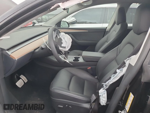2023 Tesla Model Y Performance with VIN 7SAYGDEF3PF847225, listed as a Copart auction lot 52171135 with 29,724 mi miles and Salvage Title. Bid and sale history available at DreamBid. Image 7.