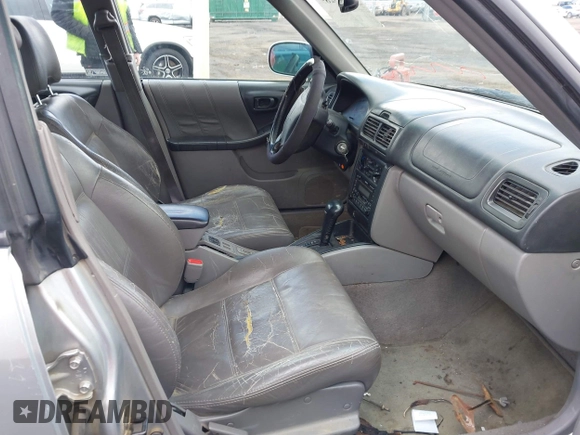2002 Subaru Forester S w/Premium Pkg with VIN JF1SF656X2H723632, listed as a IAAI auction lot 41805289 with 258,754 mi miles. Bid and sale history available at carsss.com. Image 5.