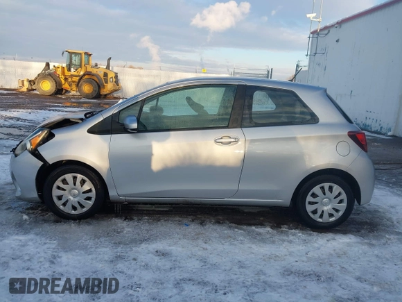 2015 Toyota Yaris L with VIN VNKJTUD36FA036518, listed as a IAAI auction lot 41233406 with 138,481 mi miles. Bid and sale history available at carsss.com. Image 14.