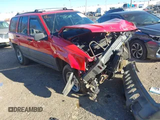 1997 Jeep Grand Cherokee TSi with VIN 1J4FX58S9VC528094, listed as a IAAI auction lot 41299294 with 1 mi miles. Bid and sale history available at carsss.com. Image 1.
