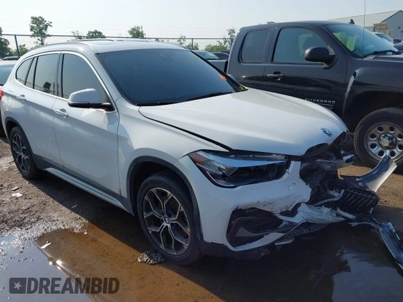2021 BMW X1 xDrive28i with VIN WBXJG9C02M3M42379, listed as a IAAI auction lot 42476221 with 60,412 mi miles and . Bid and sale history available at DreamBid. Image 1.