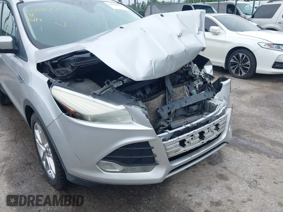 2013 Ford Escape SEL z VIN 1FMCU9H97DUA34665, wystawiony jako IAAI lot #42258567 z przebiegiem 174 227 mil mil oraz . Historia ofert i sprzedaży dostępna na DreamBid. Obrazek 6.