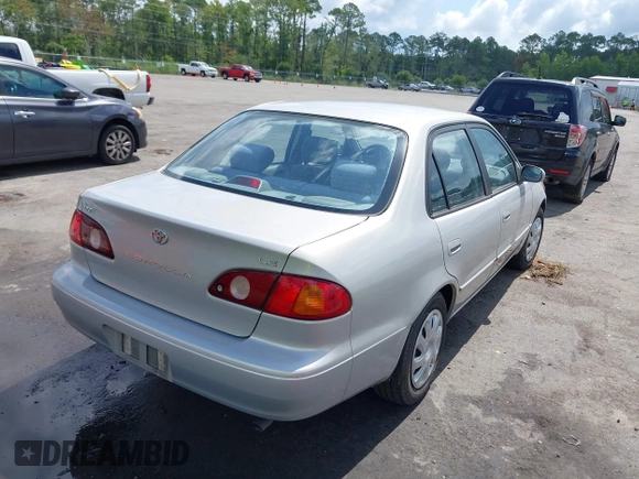 2002 Toyota Corolla CE with VIN 1NXBR12E12Z581660, listed as a IAAI auction lot 42654124 with 115,950 mi miles and . Bid and sale history available at DreamBid. Image 4.