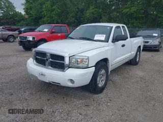 2005 Dodge Dakota SLT with VIN 1D7HW42N75S213191, listed as a IAAI auction lot 42345554 with 152,833 mi miles and . Bid and sale history available at DreamBid. Image 2.