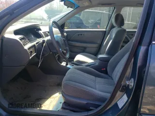 2001 Toyota Camry CE z VIN 4T1BG22KX1U788449, wystawiony jako Copart lot #48906494 z przebiegiem 105 062 mil mil oraz Szkoda całkowita • Salvage title. Historia ofert i sprzedaży dostępna na DreamBid. Obrazek 7.
