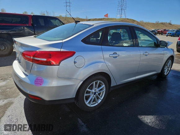 2017 Ford Focus SE with VIN 1FADP3F2XHL277097, listed as a Copart auction lot 53209825 with 100,384 mi miles and Salvage Title. Bid and sale history available at carsss.com. Image 3.