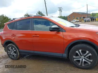 2016 Toyota RAV4 LE with VIN JTMZFREV9GJ074360, listed as a IAAI auction lot 42013611 with 87,578 mi miles. Bid and sale history available at carsss.com. Image 13.