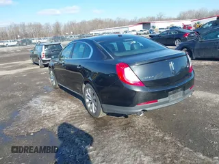 2014 Lincoln MKS with VIN 1LNHL9DKXEG606359, listed as a IAAI auction lot 41341206 with 286,687 mi miles and . Bid and sale history available at DreamBid. Image 3.