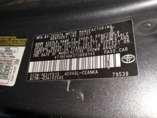 2007 Toyota Camry CE with VIN 4T1BE46K37U669145, listed as a IAAI auction lot 41927728 with 999,999 mi miles. Bid and sale history available at carsss.com. Image 9.