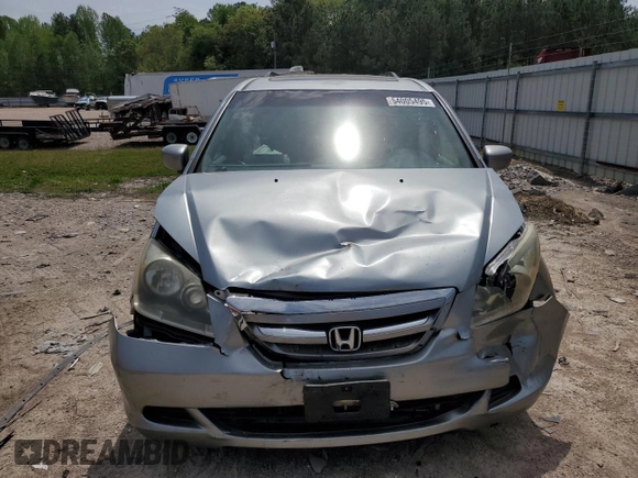 2007 Honda Odyssey EX-L with VIN 5FNRL38657B059033, listed as a Copart auction lot 54005495 with 212,674 mi miles and Salvage Title. Bid and sale history available at DreamBid. Image 5.