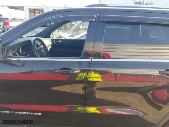 2014 Jeep Grand Cherokee Laredo with VIN 1C4RJEAG4EC136764, listed as a IAAI auction lot 41817676 with 133,943 mi miles. Bid and sale history available at carsss.com. Image 14.