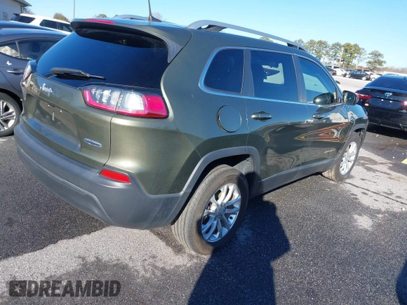 2019 Jeep Cherokee Latitude with VIN 1C4PJLCB3KD416517, listed as a IAAI auction lot 41275406 with 83,321 mi miles. Bid and sale history available at carsss.com. Image 4.