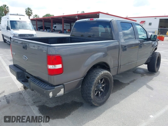 2005 Ford F-150 XLT with VIN 1FTPW12525KC03172, listed as a IAAI auction lot 42139841 with 125,258 mi miles. Bid and sale history available at carsss.com. Image 4.