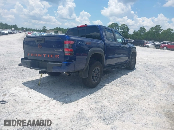 2022 Nissan Frontier Pro-4X z VIN 1N6ED1EK3NN634775, wystawiony jako IAAI lot #42789790 z przebiegiem 25 453 mil mil oraz . Historia ofert i sprzedaży dostępna na DreamBid. Obrazek 4.