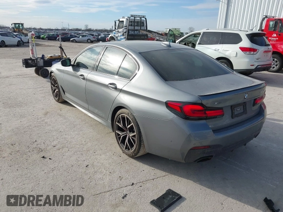 2023 BMW 5 Series 530i xDrive with VIN WBA13BJ04PCL98504, listed as a IAAI auction lot 41702411 with 27,830 mi miles and . Bid and sale history available at DreamBid. Image 3.