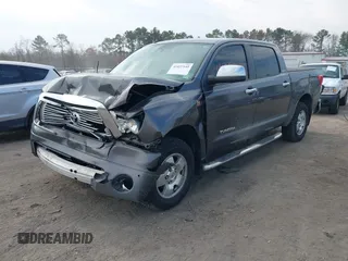 2013 Toyota Tundra Limited z VIN 5TFHY5F19DX301615, wystawiony jako IAAI lot #41837145 z przebiegiem 136 398 mil mil oraz . Historia ofert i sprzedaży dostępna na DreamBid. Obrazek 17.