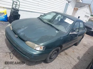 2000 Chevrolet Prizm LSi z VIN 1Y1SK5285YZ407771, wystawiony jako IAAI lot #42240643 z przebiegiem 237 408 mil mil oraz . Historia ofert i sprzedaży dostępna na DreamBid. Obrazek 2.