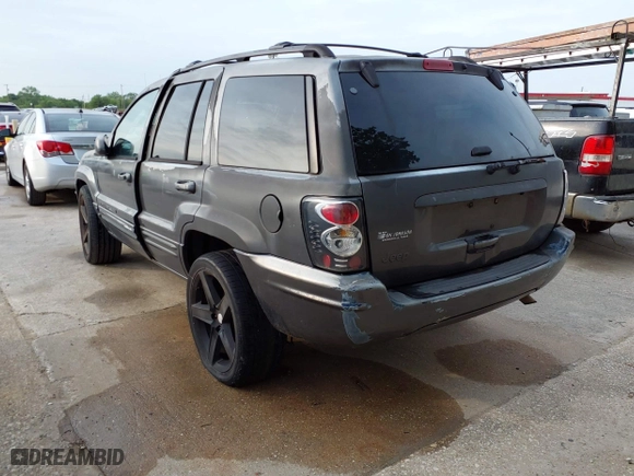 2004 Jeep Grand Cherokee Laredo with VIN 1J4GX48S14C218695, listed as a IAAI auction lot 41933611 with 158,290 mi miles. Bid and sale history available at carsss.com. Image 3.