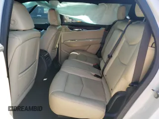 2018 Cadillac XT5 Premium Luxury FWD z VIN 1GYKNERS6JZ102163, wystawiony jako Copart lot #52817895 z przebiegiem 167 570 mil mil oraz Nie do naprawy. Historia ofert i sprzedaży dostępna na DreamBid. Obrazek 11.