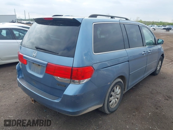 2009 Honda Odyssey EX-L with VIN 5FNRL386X9B048306, listed as a IAAI auction lot 42159882 with 189,623 mi miles. Bid and sale history available at carsss.com. Image 4.