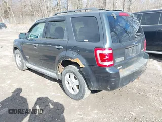 2008 Ford Escape XLT with VIN 1FMCU931X8KA86343, listed as a IAAI auction lot 42036419 with 146,836 mi miles. Bid and sale history available at carsss.com. Image 3.