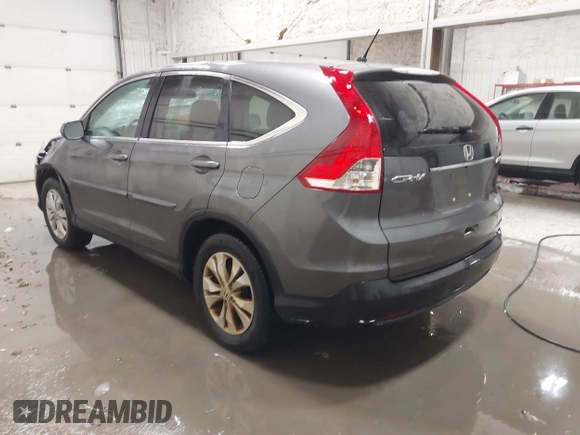 2013 Honda CR-V EX with VIN 2HKRM4H59DH682484, listed as a IAAI auction lot 41504589 with 208,260 mi miles and . Bid and sale history available at DreamBid. Image 3.