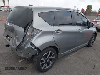 2015 Nissan Note SV with VIN 3N1CE2CP4FL432785, listed as a IAAI auction lot 41915034 with 6,902 mi miles and . Bid and sale history available at DreamBid. Image 4.