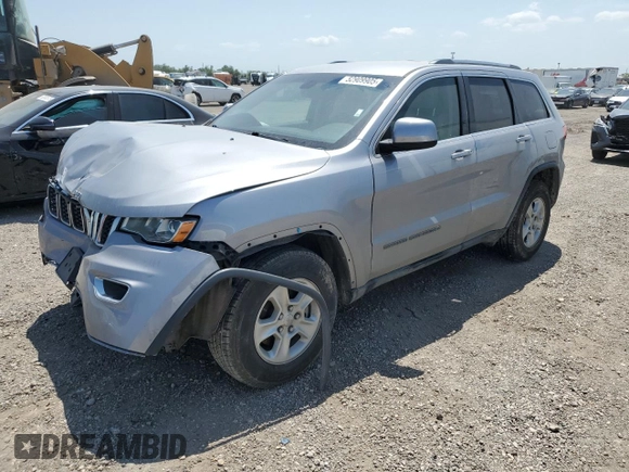 2017 Jeep Grand Cherokee Laredo with VIN 1C4RJEAG0HC816410, listed as a Copart auction lot 52909905 with 102,326 mi miles and Salvage title. Bid and sale history available at DreamBid. Image 1.
