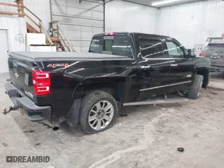 2015 Chevrolet Silverado 1500 High Country with VIN 3GCUKTEJXFG290752, listed as a IAAI auction lot 41412988 with 160,000 mi miles. Bid and sale history available at carsss.com. Image 4.