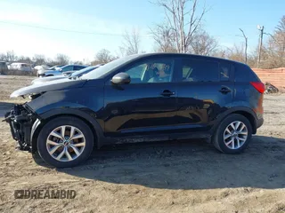 2015 Kia Sportage LX with VIN KNDPB3AC8F7761989, listed as a IAAI auction lot 41787389 with 31,706 mi miles and . Bid and sale history available at DreamBid. Image 14.