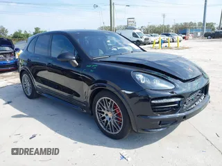 2013 Porsche Cayenne GTS with VIN WP1AD2A2XDLA78115, listed as a IAAI auction lot 41515455 with 49,219 mi miles and . Bid and sale history available at DreamBid. Image 1.