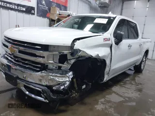 2021 Chevrolet Silverado 1500 LTZ with VIN 3GCUYGED5MG406503, listed as a IAAI auction lot 41293078 with 63,439 mi miles and . Bid and sale history available at DreamBid. Image 17.