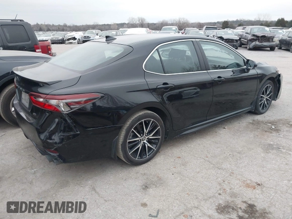 2023 Toyota Camry SE with VIN 4T1G11AK7PU123665, listed as a IAAI auction lot 41142628 with 67,294 mi miles and . Bid and sale history available at DreamBid. Image 4.
