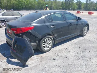 2011 Kia Optima LX with VIN KNAGM4A75B5069596, listed as a IAAI auction lot 42032235 with 93,028 mi miles. Bid and sale history available at carsss.com. Image 4.