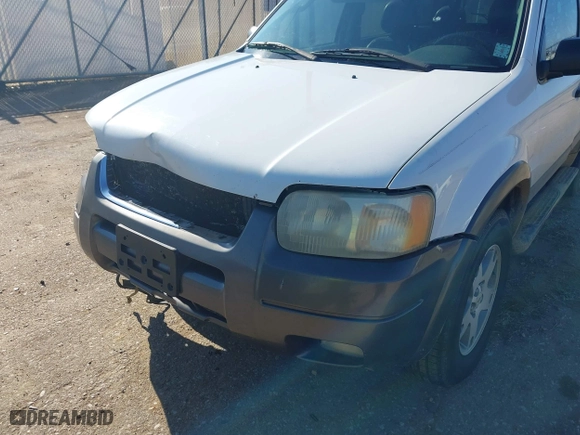 2004 Ford Escape XLT with VIN 1FMYU93174KA45992, listed as a IAAI auction lot 41169340 with 308,987 mi miles. Bid and sale history available at carsss.com. Image 14.