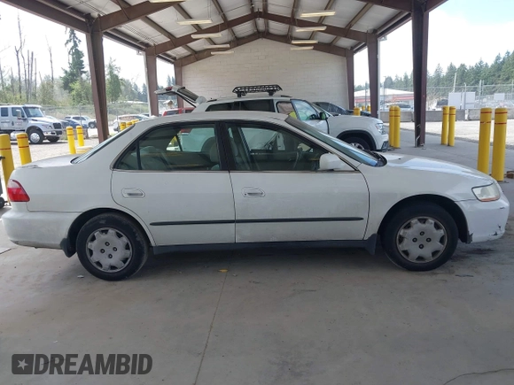 1998 Honda Accord LX with VIN 1HGCG5640WA004358, listed as a IAAI auction lot 42643808 with Not provided miles and . Bid and sale history available at DreamBid. Image 13.