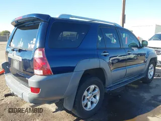 2003 Toyota 4Runner SR5 with VIN JTEZT14R238001097, listed as a IAAI auction lot 41266011 with 180,905 mi miles. Bid and sale history available at carsss.com. Image 4.