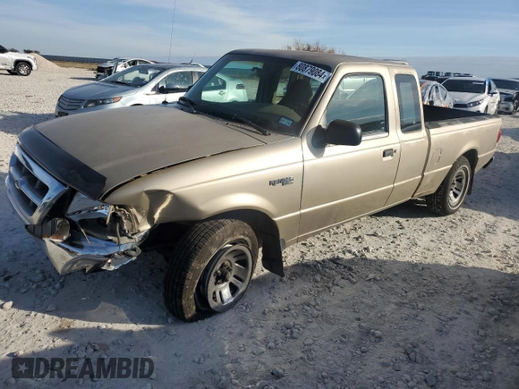 1999 Ford Ranger XLT with VIN 1FTYR14X1XPB75400, listed as a Copart auction lot 80879084 with 255,136 mi miles and Salvage Title. Bid and sale history available at DreamBid. Image 1.