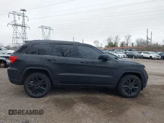 2013 Jeep Grand Cherokee Laredo with VIN 1C4RJEAG2DC573970, listed as a IAAI auction lot 41892914 with 185,050 mi miles. Bid and sale history available at carsss.com. Image 13.
