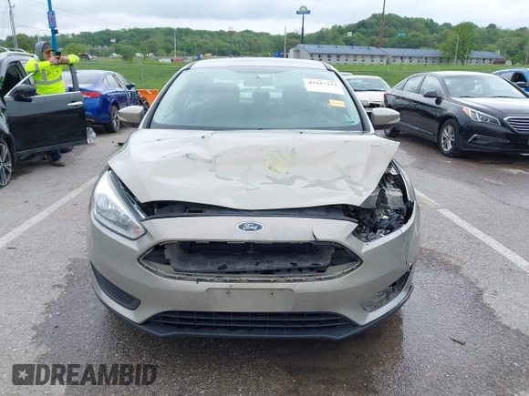 2016 Ford Focus SE z VIN 1FADP3F26GL332224, wystawiony jako IAAI lot #42167222 z przebiegiem 134 423 mil mil oraz . Historia ofert i sprzedaży dostępna na DreamBid. Obrazek 12.