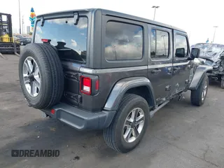 2021 Jeep Wrangler Unlimited Sahara with VIN 1C4HJXEN4MW503014, listed as a IAAI auction lot 41900234 with 16,444 mi miles and . Bid and sale history available at DreamBid. Image 4.