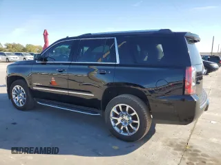 2019 GMC Yukon Denali with VIN 1GKS2CKJ9KR186604, listed as a Copart auction lot 82201124 with 110,069 mi miles and Salvage Title. Bid and sale history available at DreamBid. Image 2.