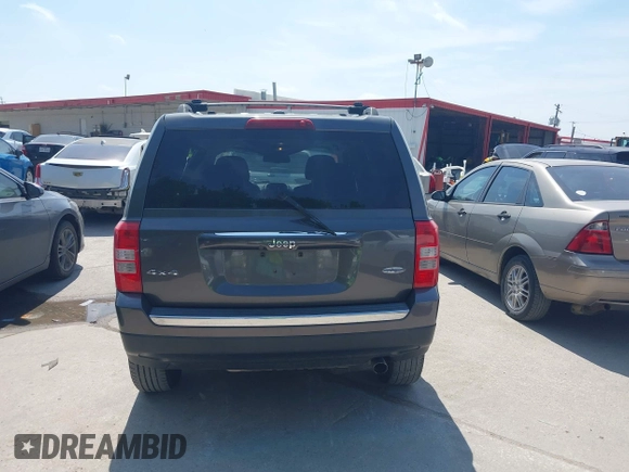 2016 Jeep Patriot Latitude with VIN 1C4NJRFB7GD658594, listed as a IAAI auction lot 42066483 with 146,492 mi miles. Bid and sale history available at carsss.com. Image 16.