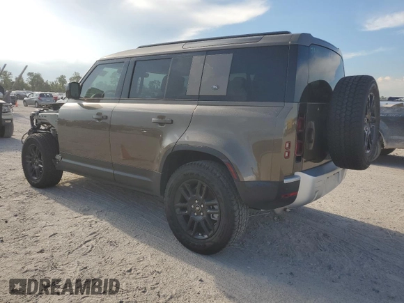 2024 Land Rover Defender S with VIN SALEJ7EU2R2272955, listed as a Copart auction lot 66796994 with 9,079 mi miles and Salvage title. Bid and sale history available at DreamBid. Image 2.