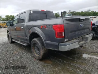 2018 Ford F-150 XL with VIN 1FTEW1EG1JFD48582, listed as a Copart auction lot 58170925 with 219,888 mi miles and Clean title. Bid and sale history available at DreamBid. Image 2.
